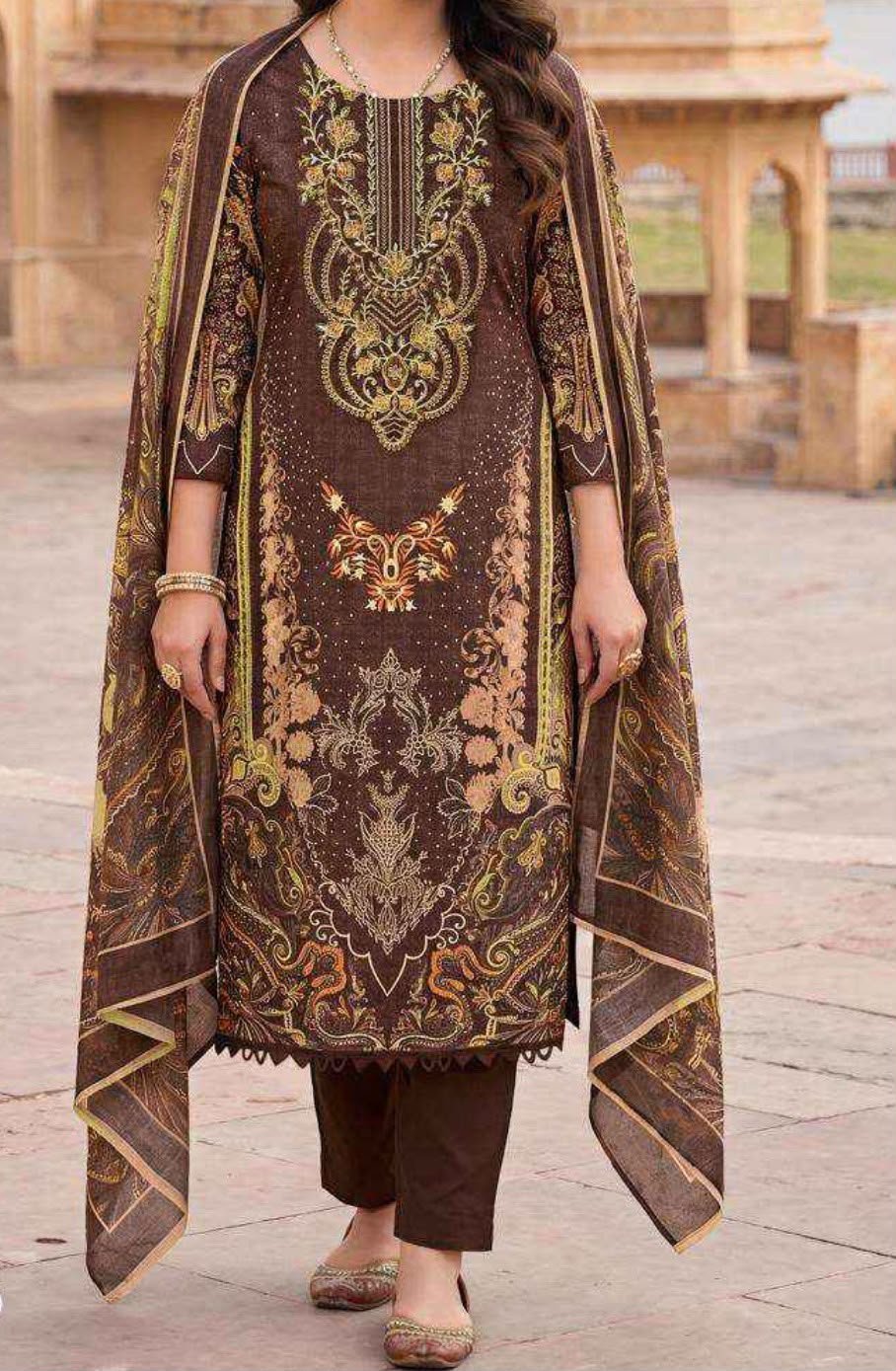 Brown embroidered shalwar kameez with ornate botanical pattern and matching dupatta