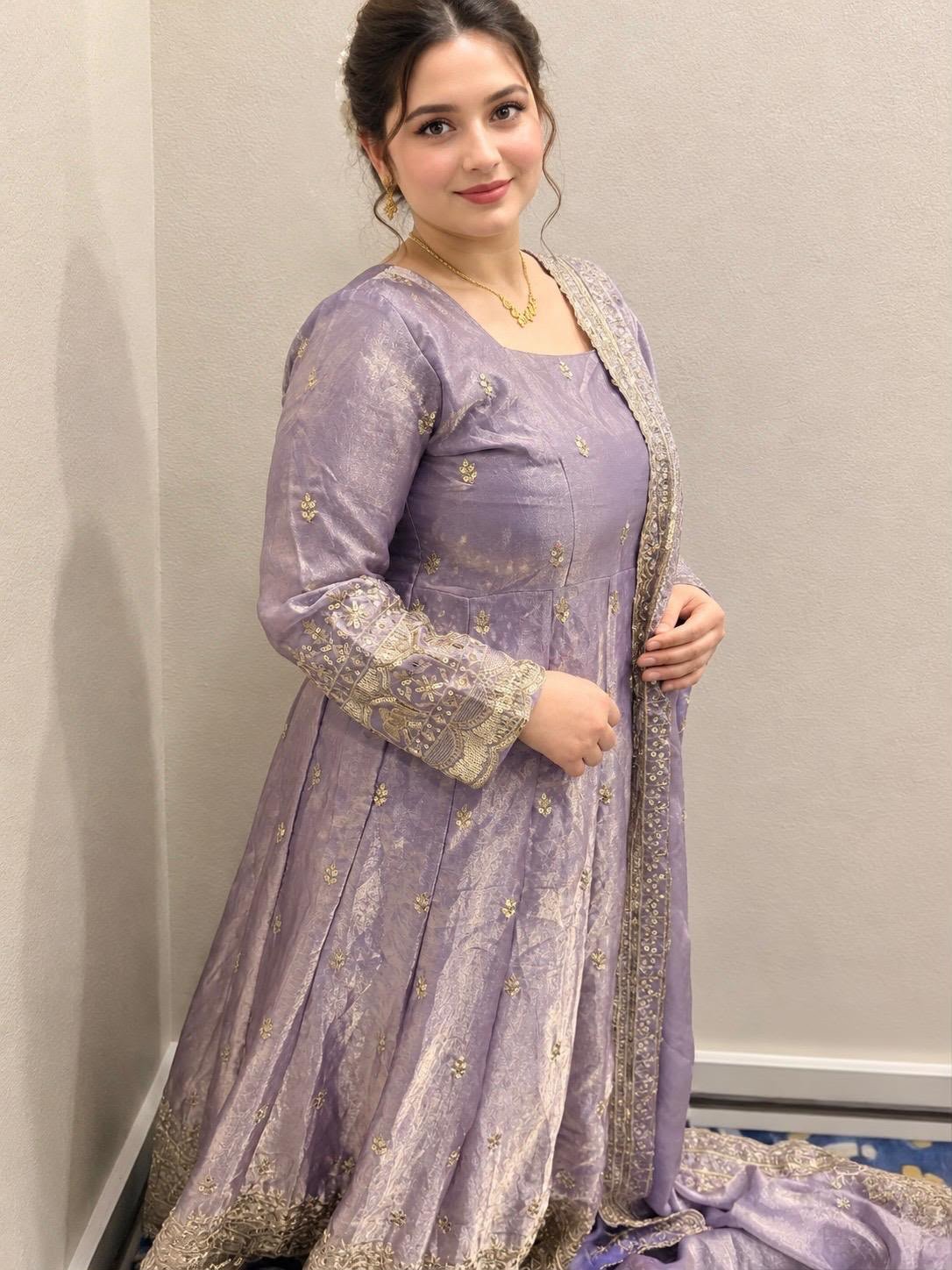 Lavender embroidered dress with ornate gold trim and matching dupatta